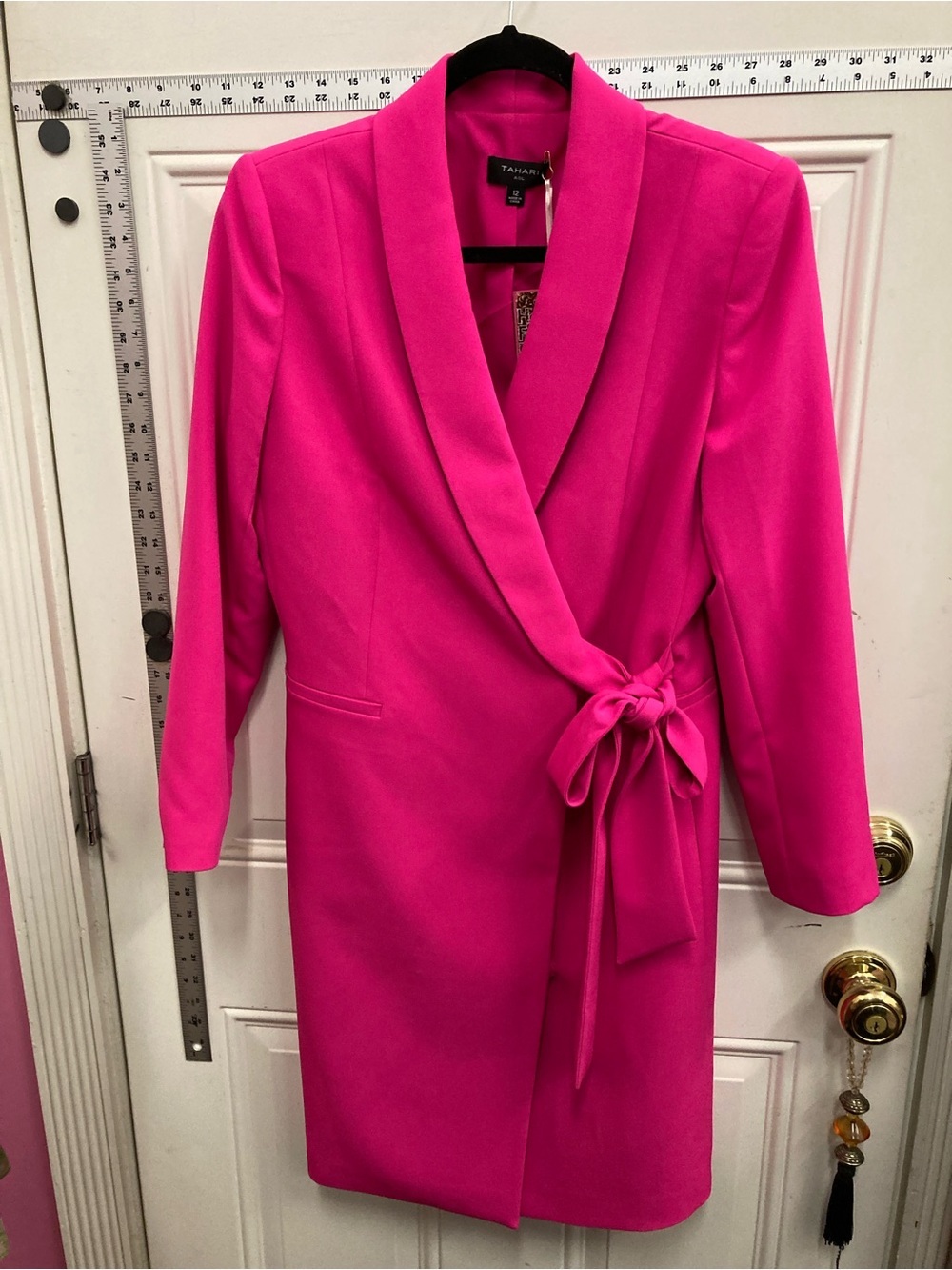 Hot pink, long coat, with tie